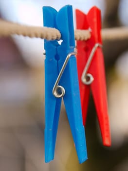 Clothes pegs on a rope