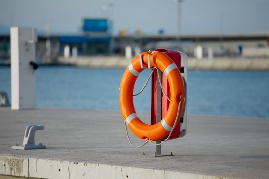 Lifebuoy in a dock by the water