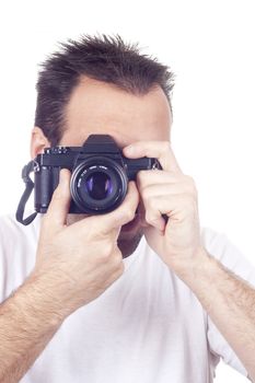 a photographer with a vintage analogic photographic camera isolated on withe background