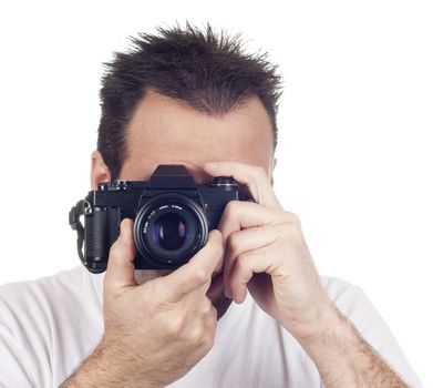 a photographer with a vintage analogic photographic camera isolated on withe background