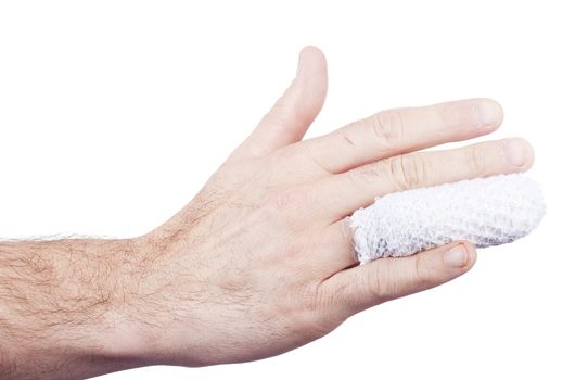 injured and wrapped finger adn hand isolated on withe background