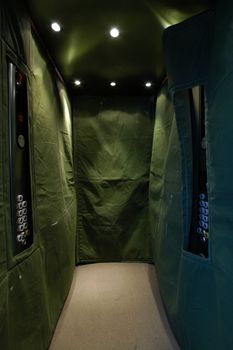 chrome elevator covered with green sheet against scratching