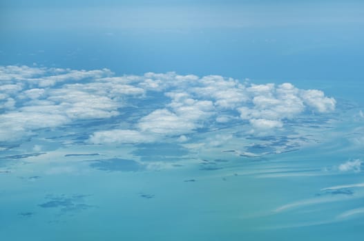 The Bahamas: aerial view of clouds and blue sea.