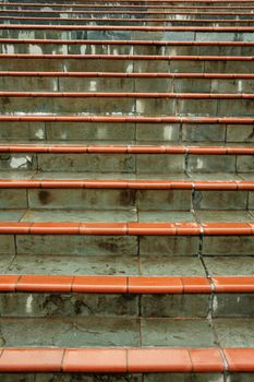 stairway made of concrete blocks and red tiles