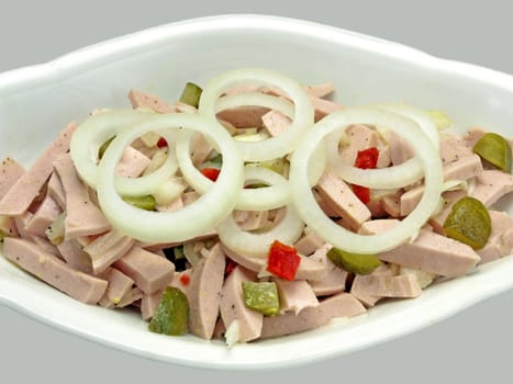 salad of sausage with onions