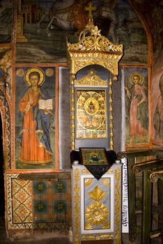 Iconography painted icons with saints on monastery wall � Preobrajenski Monastery near Veliko Turnovo Bulgaria (built in 14th century - collapsed through the ottoman - rebuilt in 19th century)