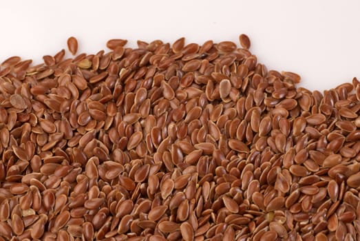 A heap of organic linseed, food background