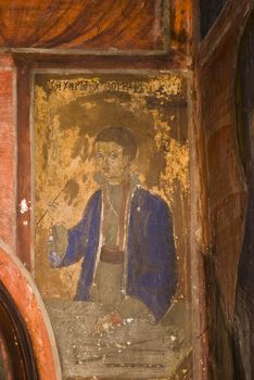 Iconography painted icons with saints on monastery wall � Preobrajenski Monastery near Veliko Turnovo Bulgaria (built in 14th century - collapsed through the ottoman - rebuilt in 19th century)