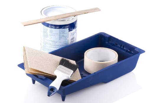 Painting tools with paint pot on a white background.
