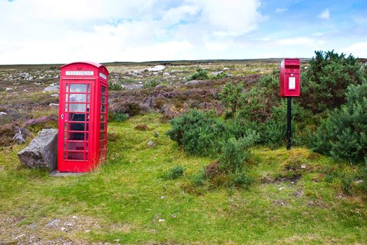 Traditional telephone and mail boxes in Scotland, in the middle of nowhere