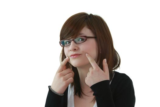 Portrait of young beautiful female teenager in glasses isolated on white background