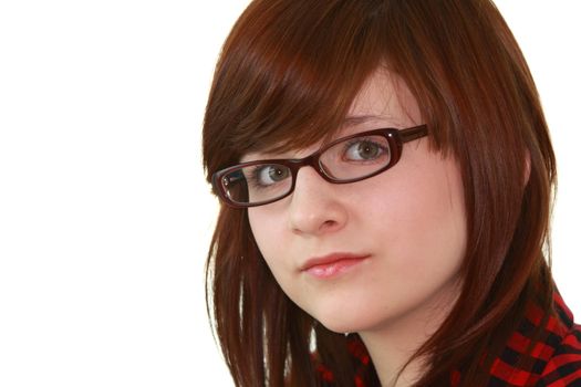 Portrait of young beautiful female teenager in glasses isolated on white background