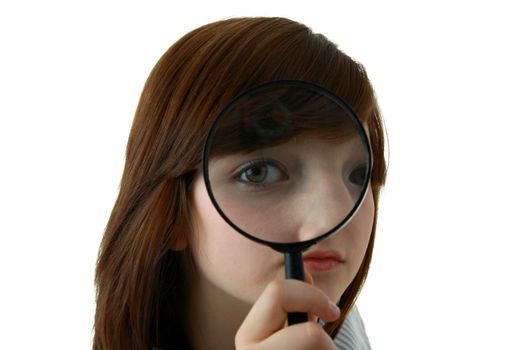 Young student with magnifier isolated on white background