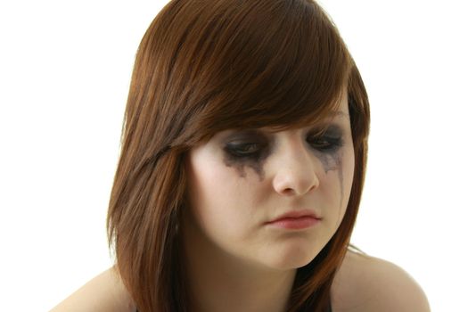 Crying young girl isolated on white background