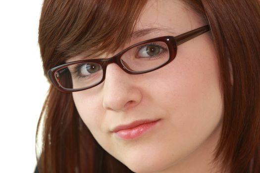 Portrait of young beautiful female teenager in glasses isolated on white background