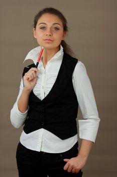 Student girl over light brown background