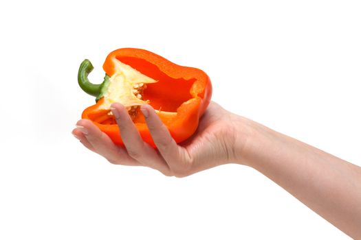 Cut bulgarian pepper on palm insulated on white background
