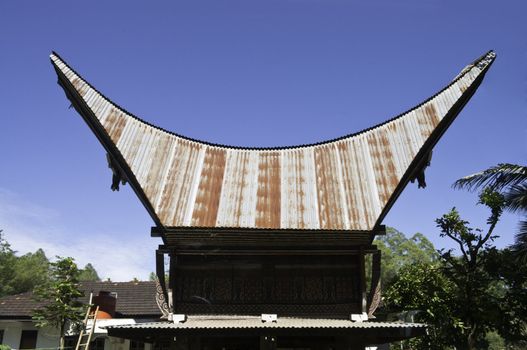 Toraja traditional house, roof horned detail in blue sky