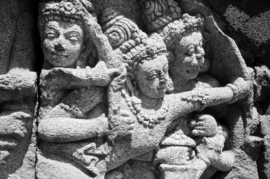 Archer shooting, hindu bas-relief in prambanan temple site
