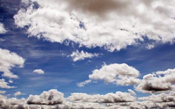 Dark blue sky, dramatic clouds