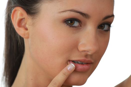 Portrait of young woman with health skin of face isolated on white background