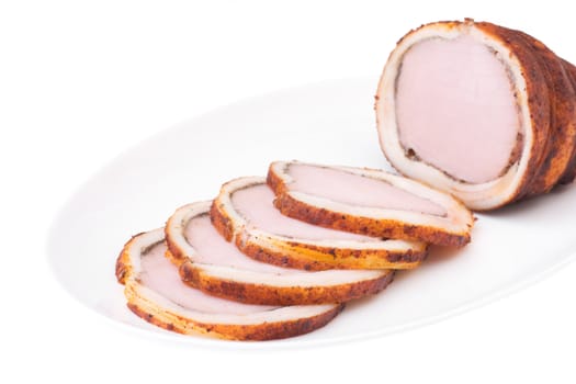 Delicious baked ham with bacon isolated over white. Bon appetit!