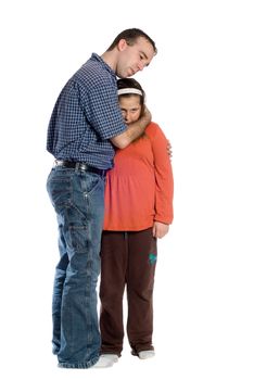 A father comforting his preteen daughter isolated against a white background