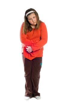 A full body view of a preteen girl holding her stomach because of diarrhea, isolated against a white background