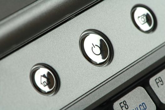 The close up shot of set of buttons of a notebook