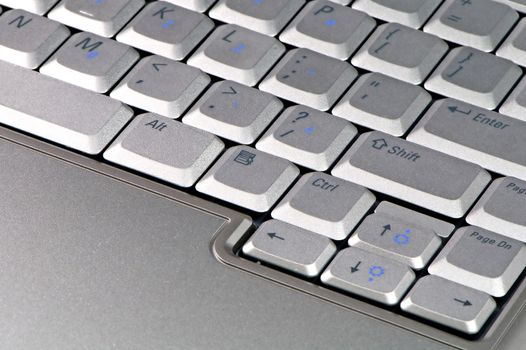 The close up of modern laptop computer's keyboard