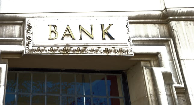 Traditional Bank sign above door