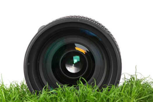 Lens on grass isolated on white background