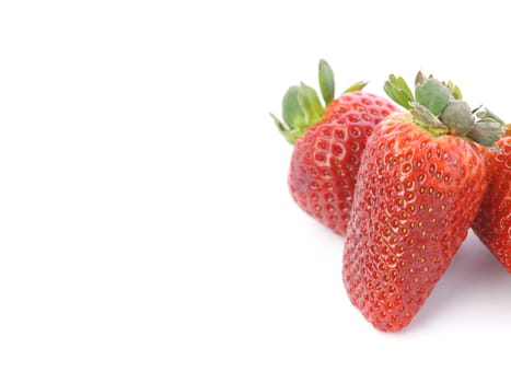 Fresh and tasty strawberries over white background