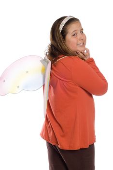 A preteen girl wearing butterfly wings, isolated against a white background