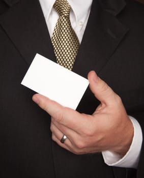 Businessman with Coat and Tie Holding Blank Business Card.