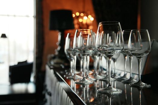wine glasses on the bar at a restaurant