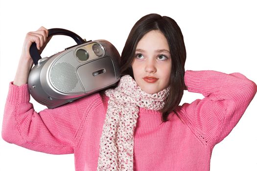 pretty girl listening music and holding portable CD radio on white background