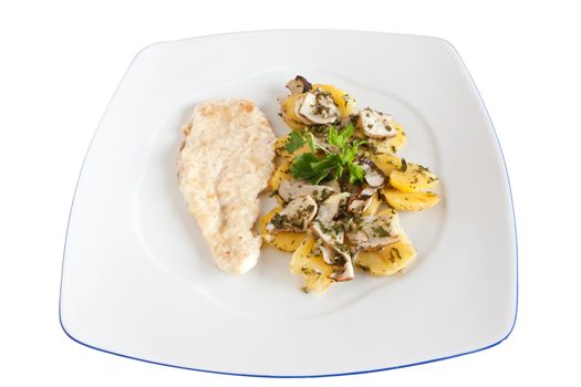 chicken escalope with baked potatoes and mushrooms isolated on white with clipping path