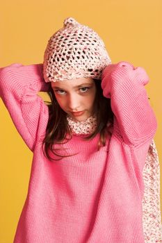 portrait of pretty girl on yellow background