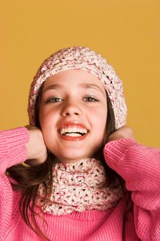 portrait of pretty girl on yellow background