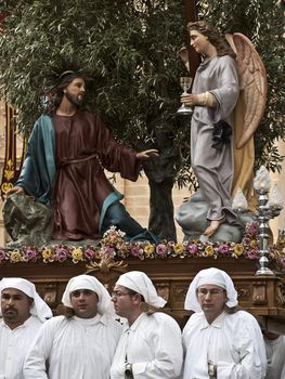 LUQA, MALTA - Friday 10th April 2009 - Religious statue and bearers during the Good Friday procession in Malta