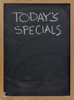 today's specials title handwritten with white chalk on blackboard, copy space below