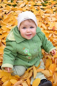 baby at a park in Autumn