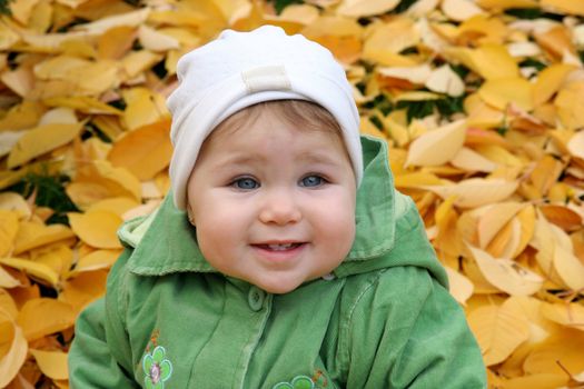 baby at a park in Autumn