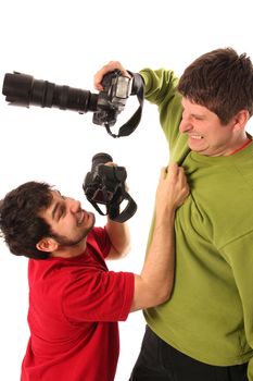 Two Professional photographers fighting on white background