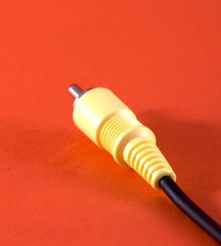 Head of a yellow video cable