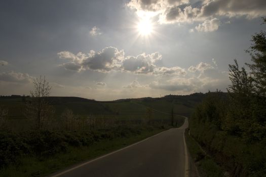 Sun coming out of clouds