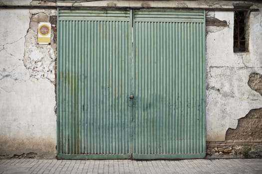 Old door in old street of shops