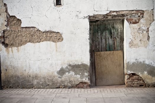 Old door in old street of shops