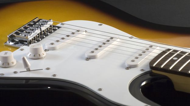 Closeup of an electric guitar, strings